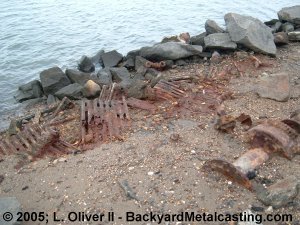 Scrap iron litters the shore